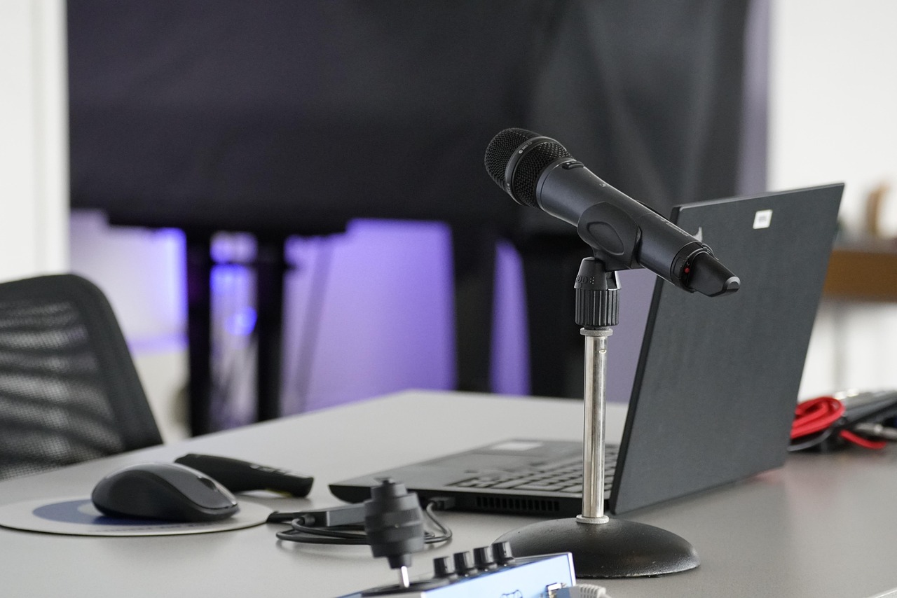 Laptop, conference table, mouse — Explore the SR&ED Eligibility Criteria in the Medical Cannabis Industry