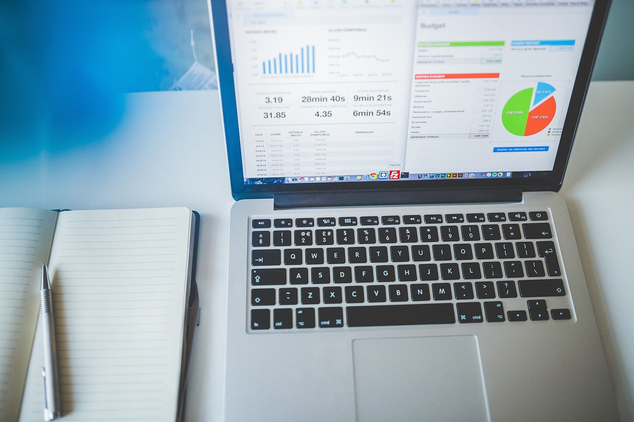 Laptop, notebook, business — Gothenburg Relocation Experts: Unlocking the Benefits of Professional Moving Services