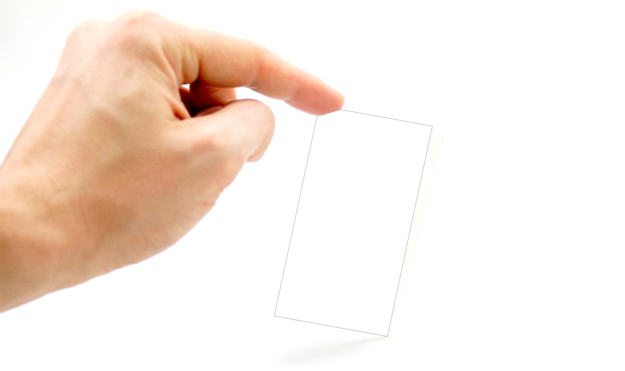 Business card, business, hand — How Variable Expenses Can Impact your Business Budget